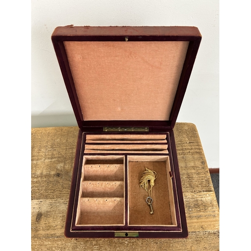 343 - A vintage brass inlaid jewellery box with secret opening together with a vintage leather covered exa... 