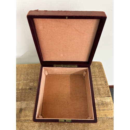 343 - A vintage brass inlaid jewellery box with secret opening together with a vintage leather covered exa... 