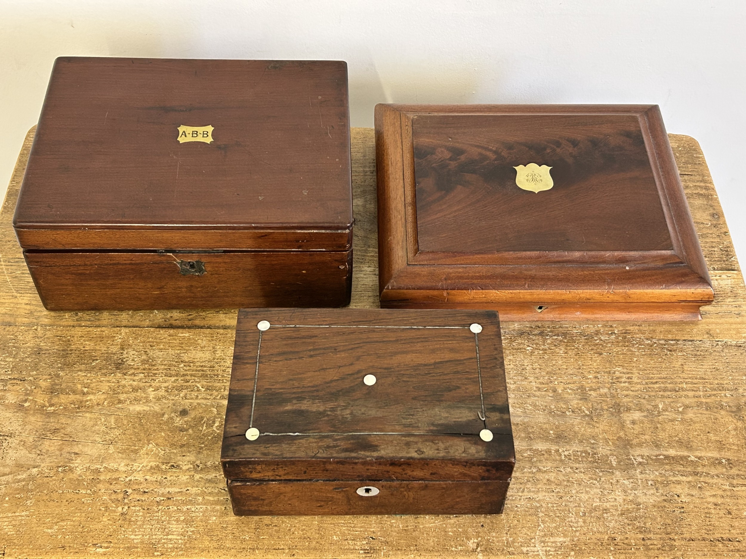 A vintage mahogany small writing box together with a mahogany jewellery ...