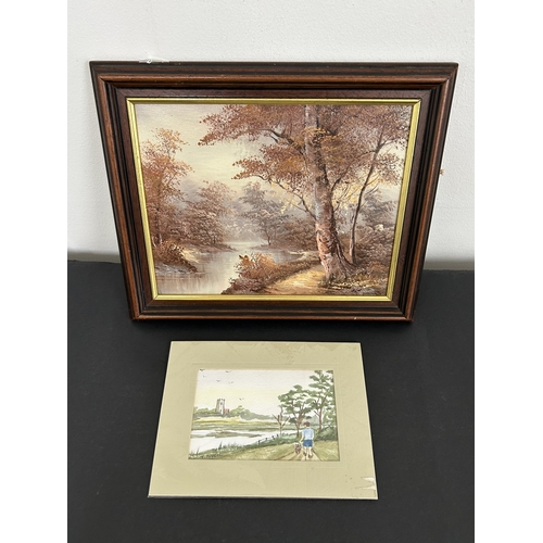 447 - A small framed oil on canvas of a forest and river scene together with a small watercolour signed J ... 