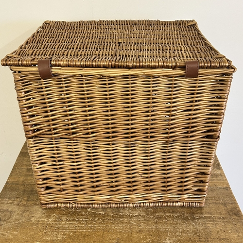 46 - A wicker lidded box stencilled 'F & M' to the front, approx. 16 1/2