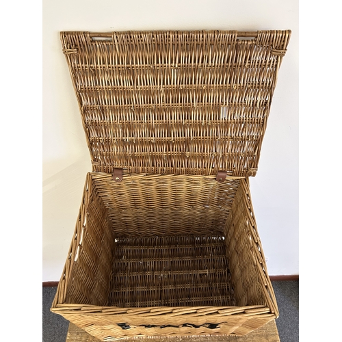 46 - A wicker lidded box stencilled 'F & M' to the front, approx. 16 1/2