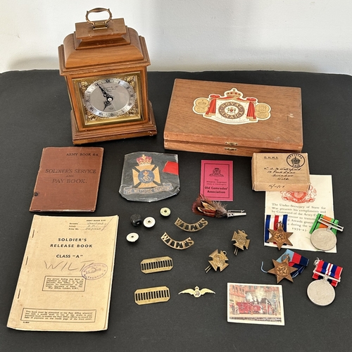 50 - A collection of WW2 era one mans medals, service and release book, a small amount of insignia etc an... 