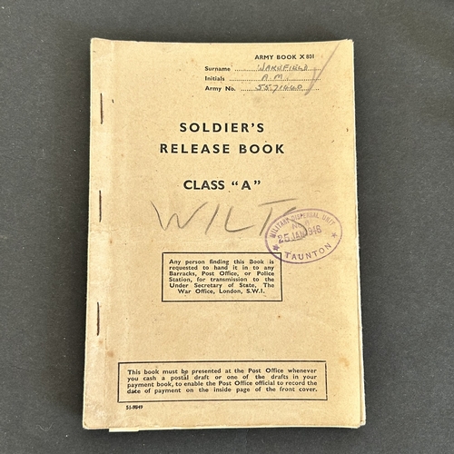 50 - A collection of WW2 era one mans medals, service and release book, a small amount of insignia etc an... 