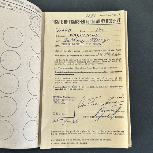 50 - A collection of WW2 era one mans medals, service and release book, a small amount of insignia etc an... 