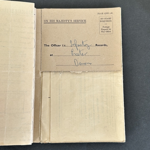 50 - A collection of WW2 era one mans medals, service and release book, a small amount of insignia etc an... 