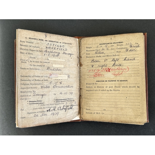 50 - A collection of WW2 era one mans medals, service and release book, a small amount of insignia etc an... 