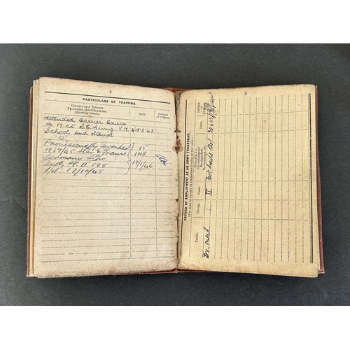 50 - A collection of WW2 era one mans medals, service and release book, a small amount of insignia etc an... 