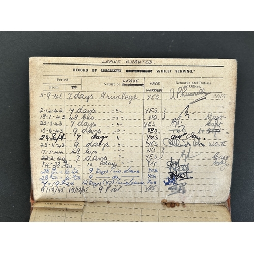 50 - A collection of WW2 era one mans medals, service and release book, a small amount of insignia etc an... 