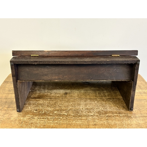 62 - A wooden table top display cabinet with blue baize, 16 3/4