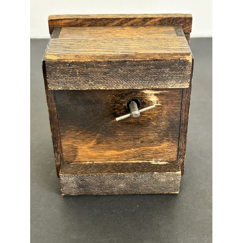 78 - A vintage small wood music box plus a German spring loaded magnifier and a Selkirk Glass paperweight