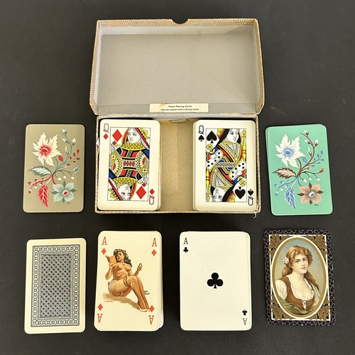79 - A vintage pack of saucy picture playing cards plus two boxed sets of cards and one other