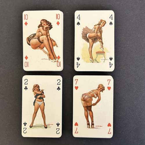 79 - A vintage pack of saucy picture playing cards plus two boxed sets of cards and one other
