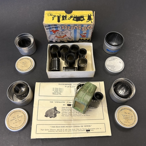 89 - A vintage Dumbo box with 'film strips' of short rolls of film including Disney Peter Pan, 1960 Royal... 