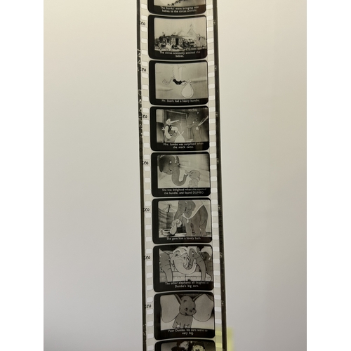 89 - A vintage Dumbo box with 'film strips' of short rolls of film including Disney Peter Pan, 1960 Royal... 