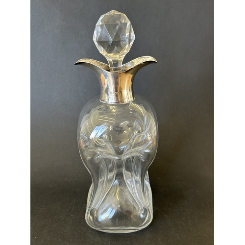 99 - A decorative hallmarked silver and blown glass 'glug glug' decanter, either London 1897 or 1903 (dat... 