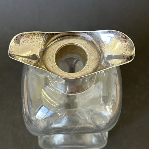 99 - A decorative hallmarked silver and blown glass 'glug glug' decanter, either London 1897 or 1903 (dat... 