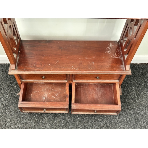 400 - A vintage Chinese style open bookcase with four small drawers at the base, 44