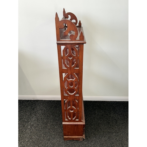 400 - A vintage Chinese style open bookcase with four small drawers at the base, 44