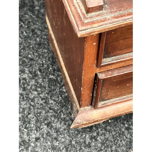 400 - A vintage Chinese style open bookcase with four small drawers at the base, 44