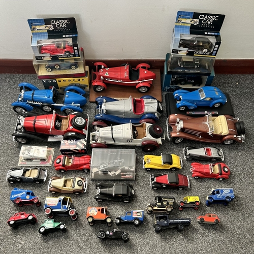 411 - Boxed and loose vintage collectors vehicles including Matchbox and Lledo, a Burago 1:20 scale Merced... 