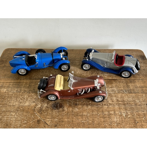 411 - Boxed and loose vintage collectors vehicles including Matchbox and Lledo, a Burago 1:20 scale Merced... 