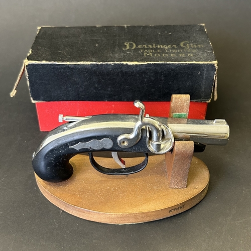 417 - An Art Deco period Bayer large and heavy table lighter with faux tortoiseshell decoration and press ... 