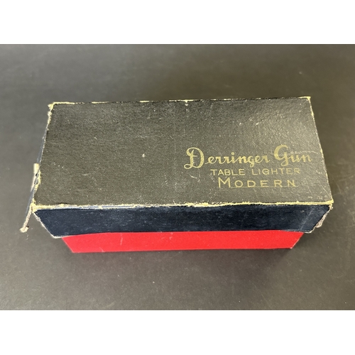 417 - An Art Deco period Bayer large and heavy table lighter with faux tortoiseshell decoration and press ... 