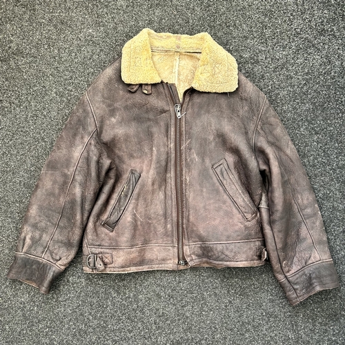 433 - A vintage leather flying style jacket with label for 'The Original McNeal' (signs of use)
