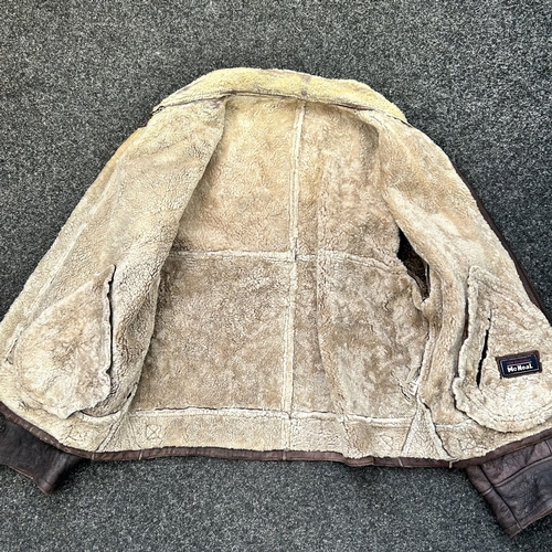433 - A vintage leather flying style jacket with label for 'The Original McNeal' (signs of use)