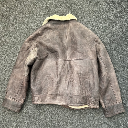 433 - A vintage leather flying style jacket with label for 'The Original McNeal' (signs of use)