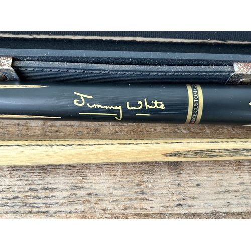 459 - A BCE custom snooker cue, marked 'Jimmy White', in its original case (end of cue with losses and box... 