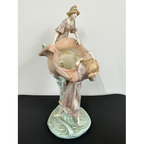 100 - A large Royal Dux Art Nouveau porcelain figure group of two females with a large shell, approx. 19 1... 