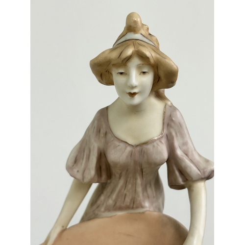 100 - A large Royal Dux Art Nouveau porcelain figure group of two females with a large shell, approx. 19 1... 