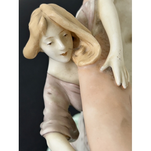 100 - A large Royal Dux Art Nouveau porcelain figure group of two females with a large shell, approx. 19 1... 