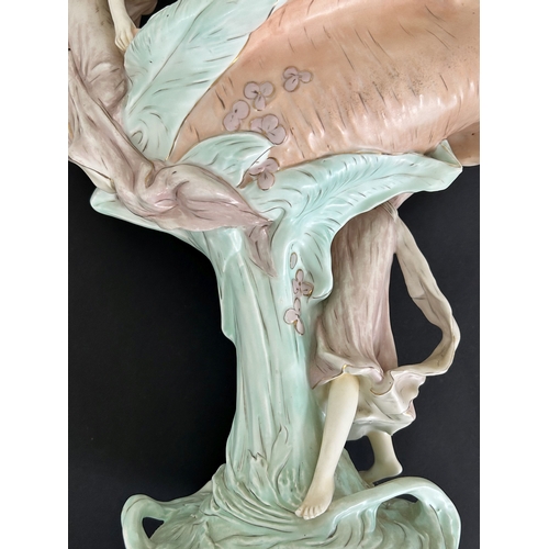 100 - A large Royal Dux Art Nouveau porcelain figure group of two females with a large shell, approx. 19 1... 