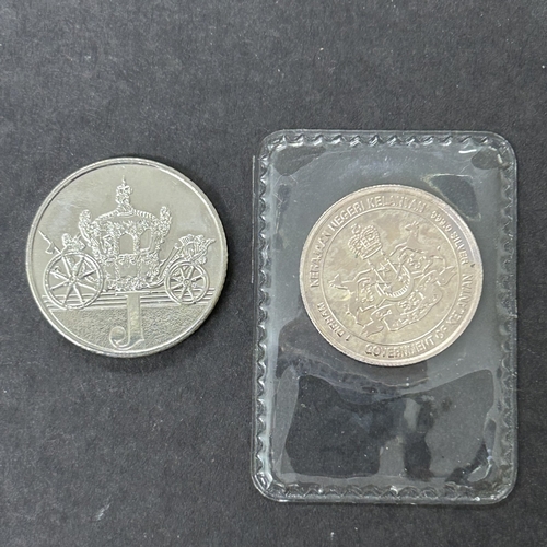 106 - A 'Government of Kelantan' one dirham 999.0 silver fantasy coin, weight approx. 3.5g together with a... 