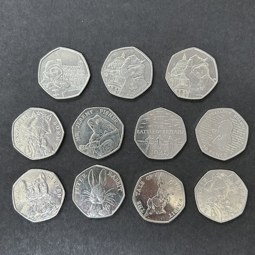 117 - Eleven collectors 50p's (in circulated condition)