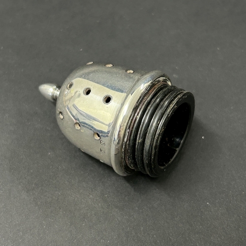 185 - A hallmarked silver sugar caster, Birmingham 1937, this contains a Bakelite lined interior in the ba... 