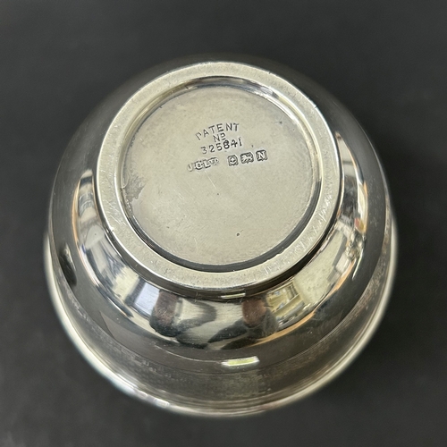 185 - A hallmarked silver sugar caster, Birmingham 1937, this contains a Bakelite lined interior in the ba... 