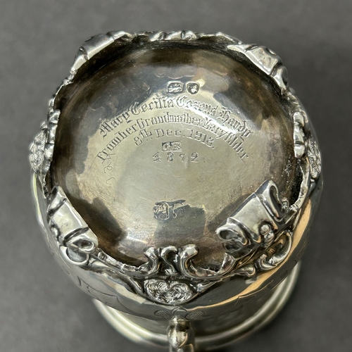 186 - A Victorian hallmarked silver christening mug, London 1840 with two engraved gift dedications, one d... 