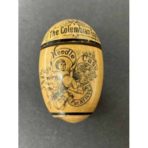 199 - A Victorian treen 'The Columbian Egg' needle case from the 'Worlds Columbian Exposition', German mad... 