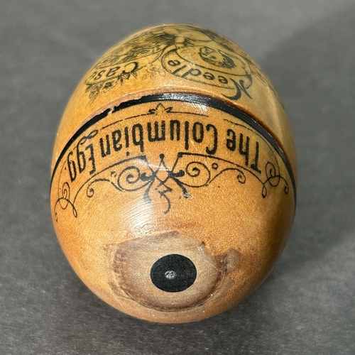 199 - A Victorian treen 'The Columbian Egg' needle case from the 'Worlds Columbian Exposition', German mad... 