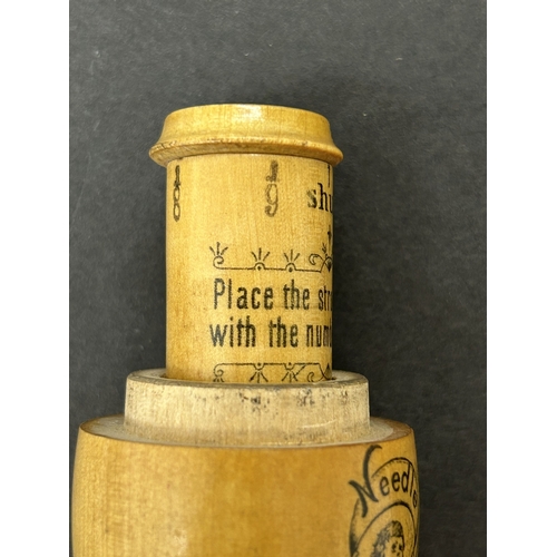 199 - A Victorian treen 'The Columbian Egg' needle case from the 'Worlds Columbian Exposition', German mad... 