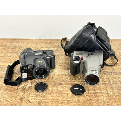 220 - An Olympus A2300 Super Zoom 35mm camera plus a digital Olympus C-100L camera in a case (all untested... 