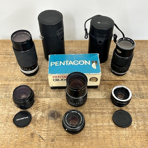 228 - A mixed lot of vintage camera lenses to include a Pentacon 38/135 ADB, four 35mm SLR lenses includin... 