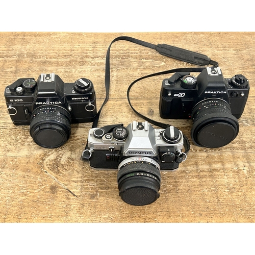 229 - Three 35mm film cameras to including Olympus OM10, Praktica BX20 and Praktica B100 (all untested and... 