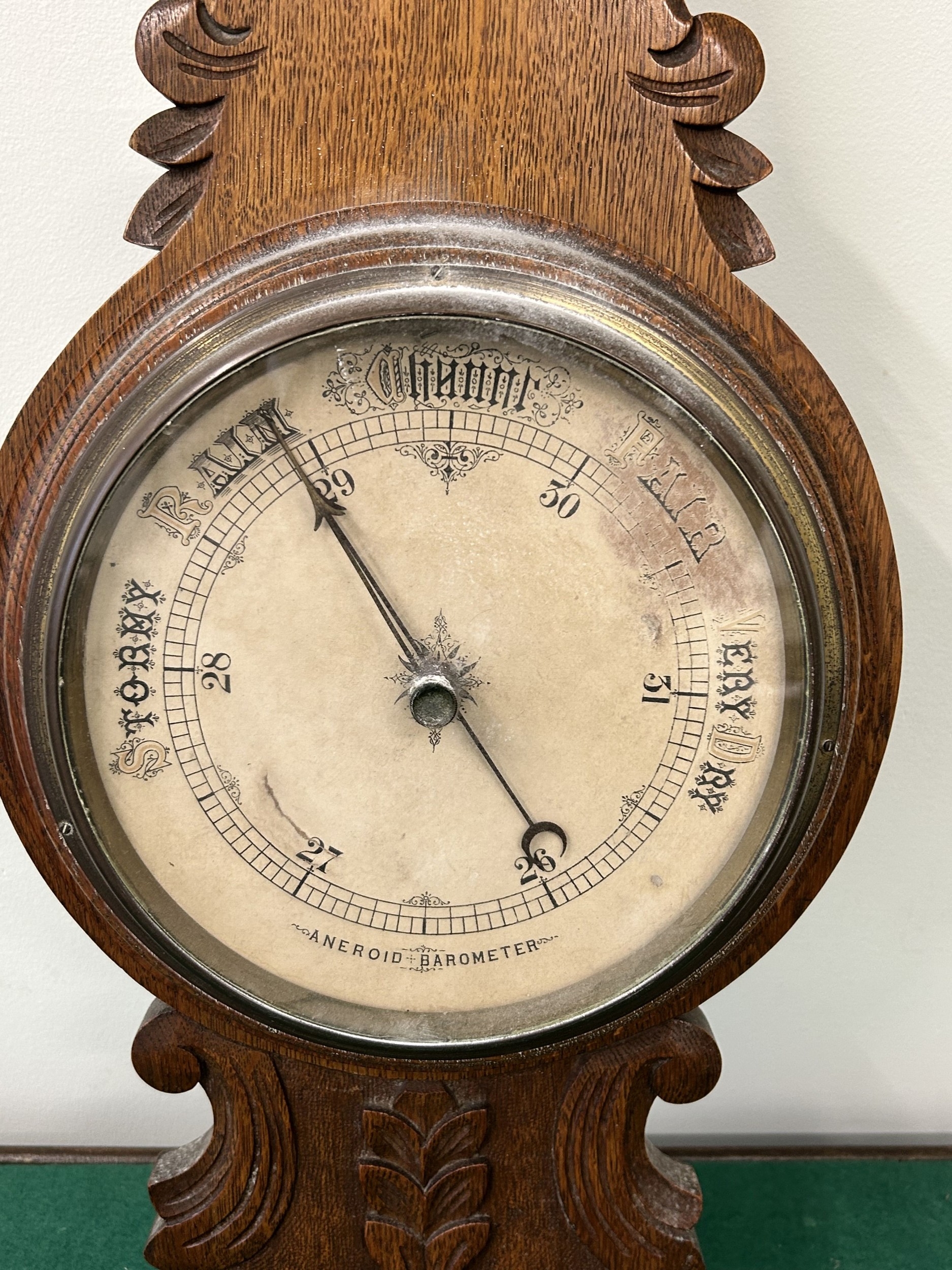 A vintage oak aneroid banjo barometer, approx. 34