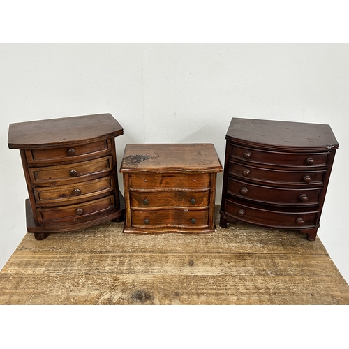63 - Three small wooden multi drawer jewellery chests, the tallest approx. 9 1/2