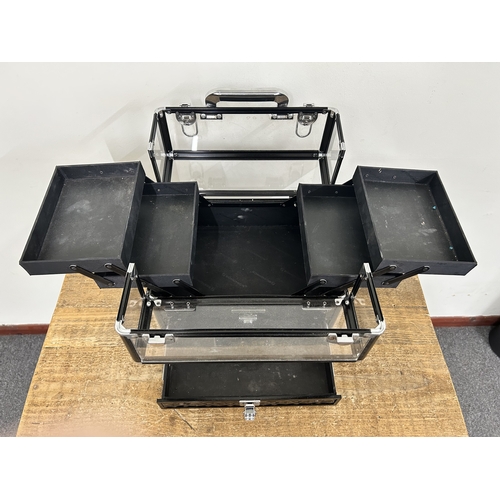 65 - A leather covered jewellery box, a black and clear plastic example, an empty Links box and an empty ... 